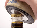 nhl game used puck bottle opener