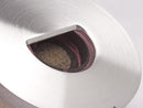 image displaying a close up of the baseball core visible within the bottle opener finding.