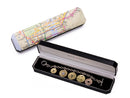 image displaying 5 new york transit token bracelet in new york subway map themed gift box