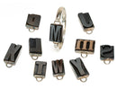 image displaying group of letterpress charms
