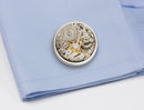 image displaying round vintage watch movement cuff links on shirt cuff