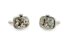 image displaying a pair of hamilton watch movement cuff links with rectangular shape and crowns.