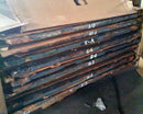 image displaying stack of removed boston garden parquet floor panels.