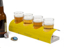 image displaying a beer flight made from candlestick park goal post with four shot glasses of beer and a beer bottle next to it.