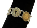 image displaying 5 new york transit token bracelet set in sterling silver bezels on a black background.