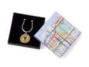 image displaying new york transit token horseshoe key ring in new york subway map themed gift box