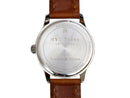 image displaying back of new york transit token watch with engraving ny token 1970 - 1980