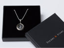 image displaying vintage typewriter key charm letter j on a sterling silver chain in gift box