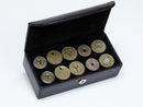 image displaying group of new york transit token cuff links with leather case