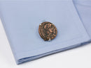 image displaying roman coin cuff links on shirt cuff
