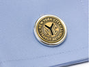 image displaying new york transit token cuff link on shirt cuff