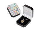 image displaying new york transit token necklace in new york subway map themed gift box