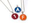 image displaying group of new york subway route indicator necklaces